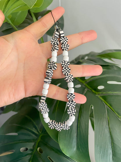 Checkerboard black and white mobile phone charm strap