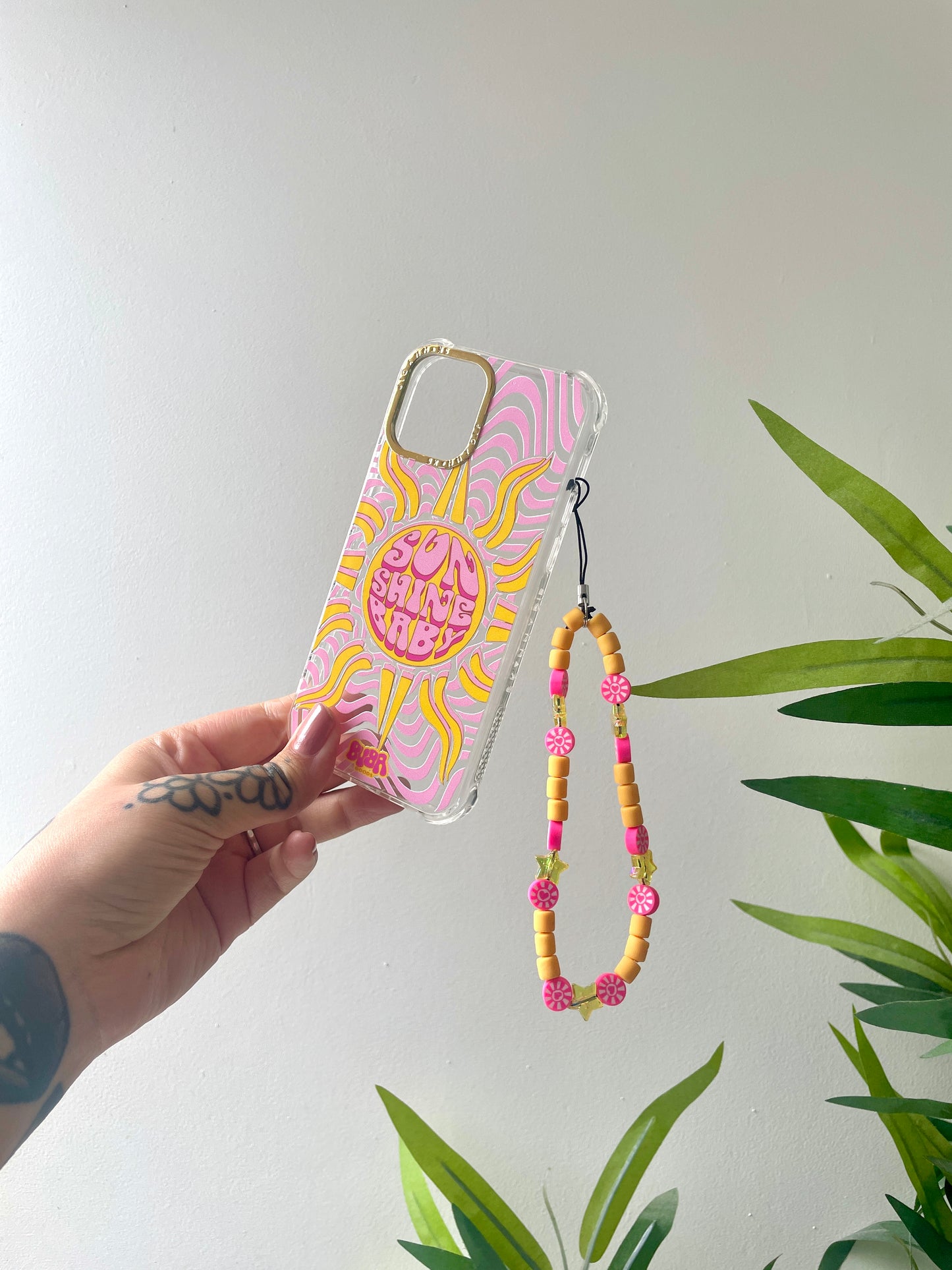 BUBA GOODS x SKINNYDIP limited edition yellow and pink mobile phone charm strap